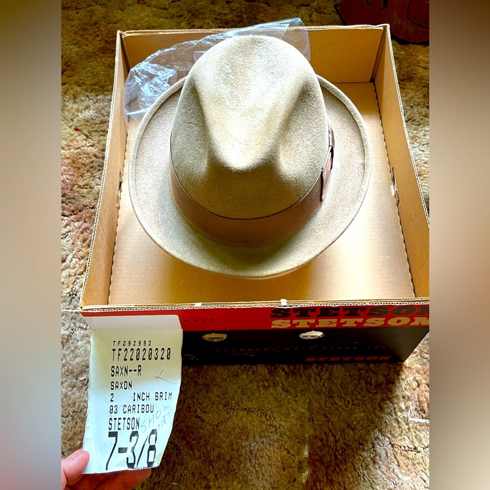 Original box with a 7 and 3/8ths Stetson khaki colored hat available for you.